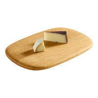Two cheese wedges on a wooden board; features creamy white and rich brown hues with smooth textures.