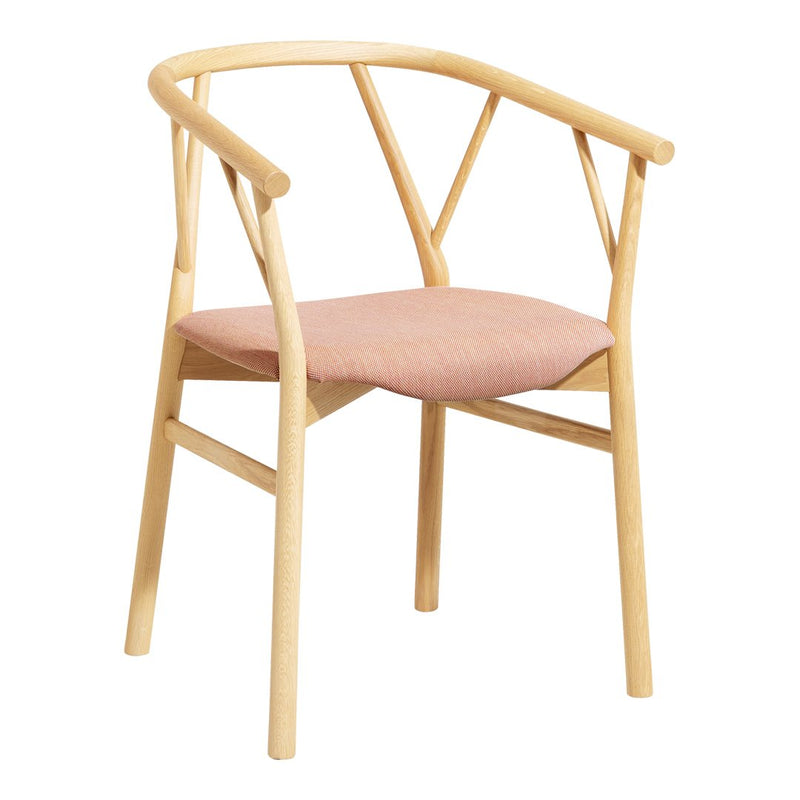 Natural wood chair with soft pink fabric seat, featuring a minimalist design and clean lines. Perfect for modern decor.