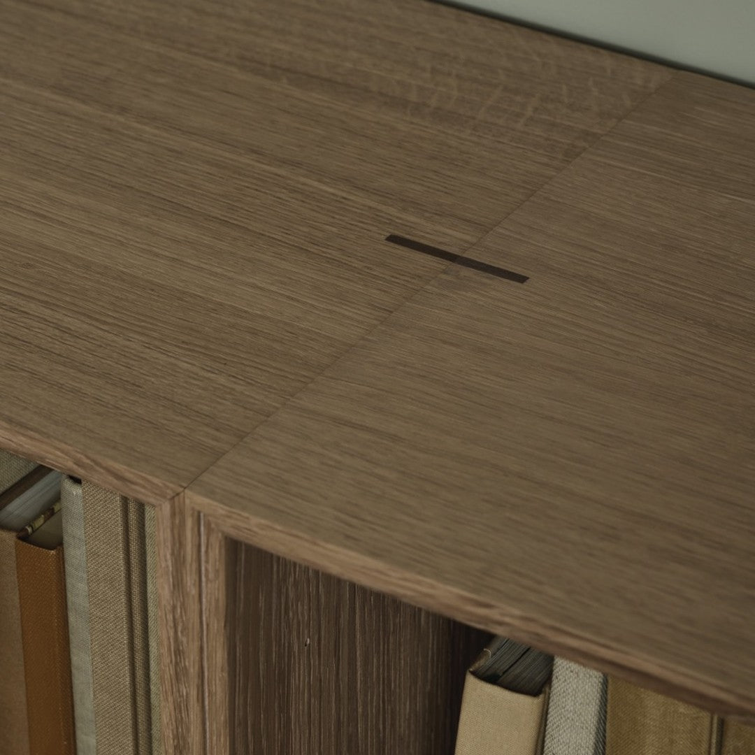 Light brown wood grain with subtle variations in texture and a sleek, minimalistic slot detail.