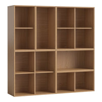 Light oak bookshelf with a simple, modern design featuring multiple open cubbies for versatile storage.