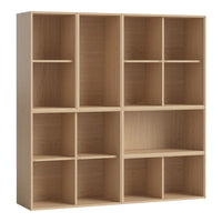 Light wood bookshelf with a minimalist design featuring square and rectangular compartments.