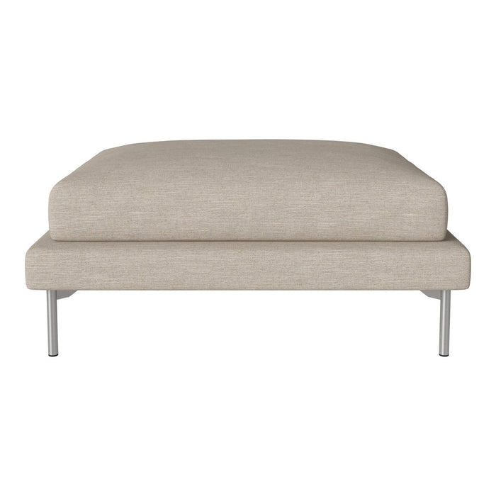 Beige upholstered ottoman with a smooth texture and sleek metal legs, perfect for modern decor.