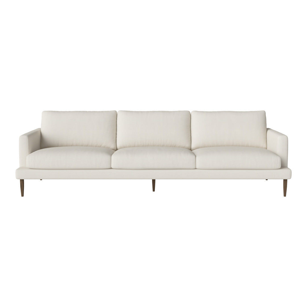 Cream upholstered sofa with simple, modern lines and light wooden legs. Perfect for minimalist decor.
