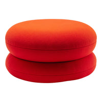 Bright red round cushions stacked together, featuring a smooth texture and bold color for vibrant décor.
