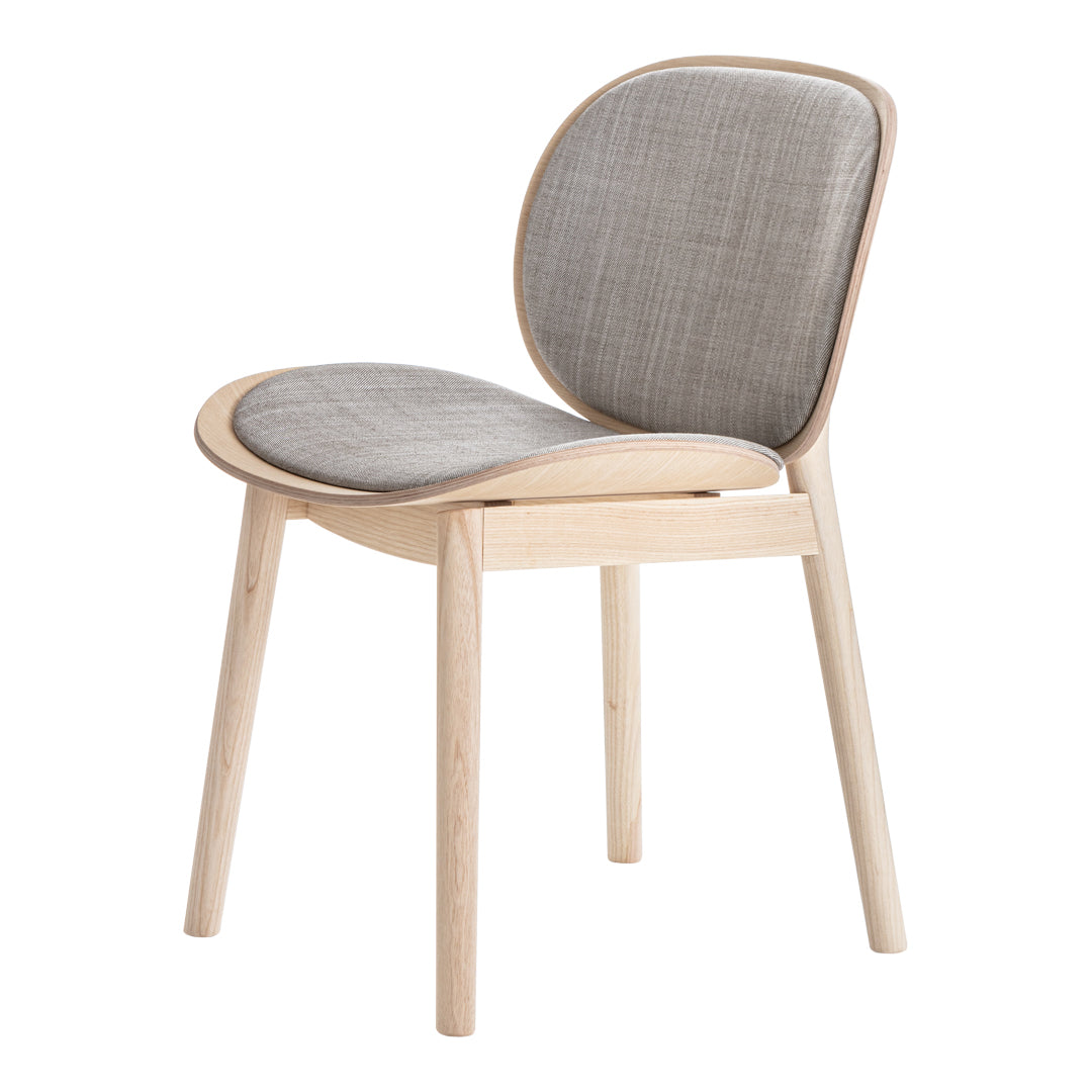 Light wooden chair with a smooth, rounded design and textured gray fabric upholstery. Minimalist and modern aesthetic.