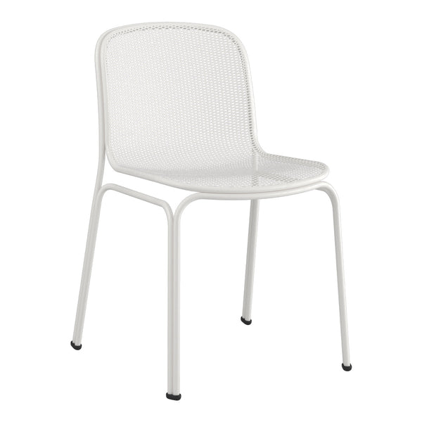 White mesh dining chair with sleek lines and minimalistic design, perfect for modern interiors.