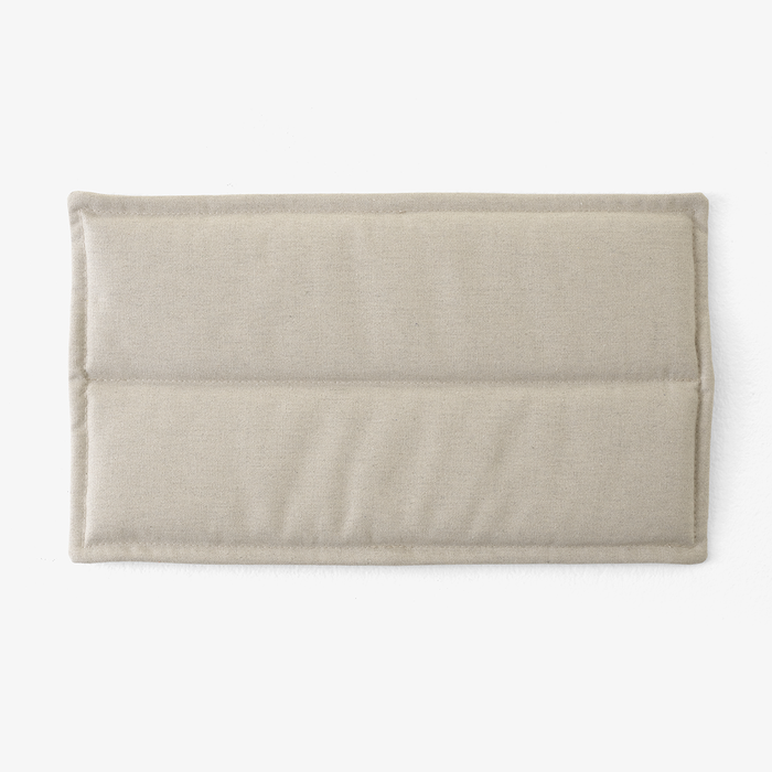 Beige rectangular cushion with a smooth, textured finish and two horizontal seams. Ideal for minimalist decor.