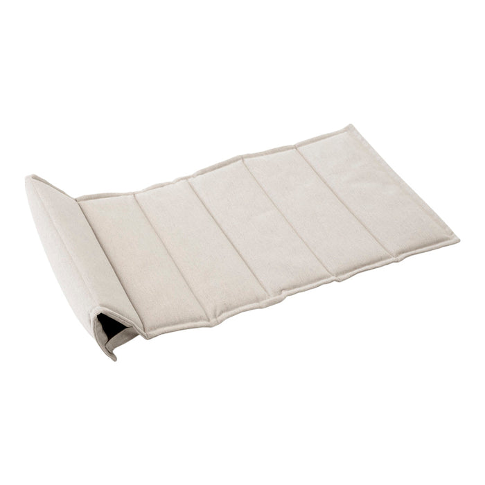 Beige padded mat with a smooth texture and simple, clean lines, showcasing a neutral color palette.