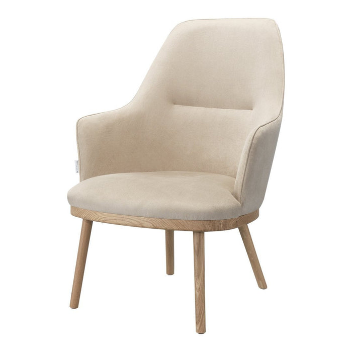 Beige upholstered armchair with a smooth texture and natural wood legs, featuring a minimalist design.