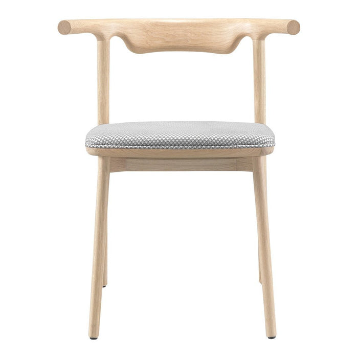 Light wood chair with a gray and white patterned seat, featuring a minimalist design and sleek lines.