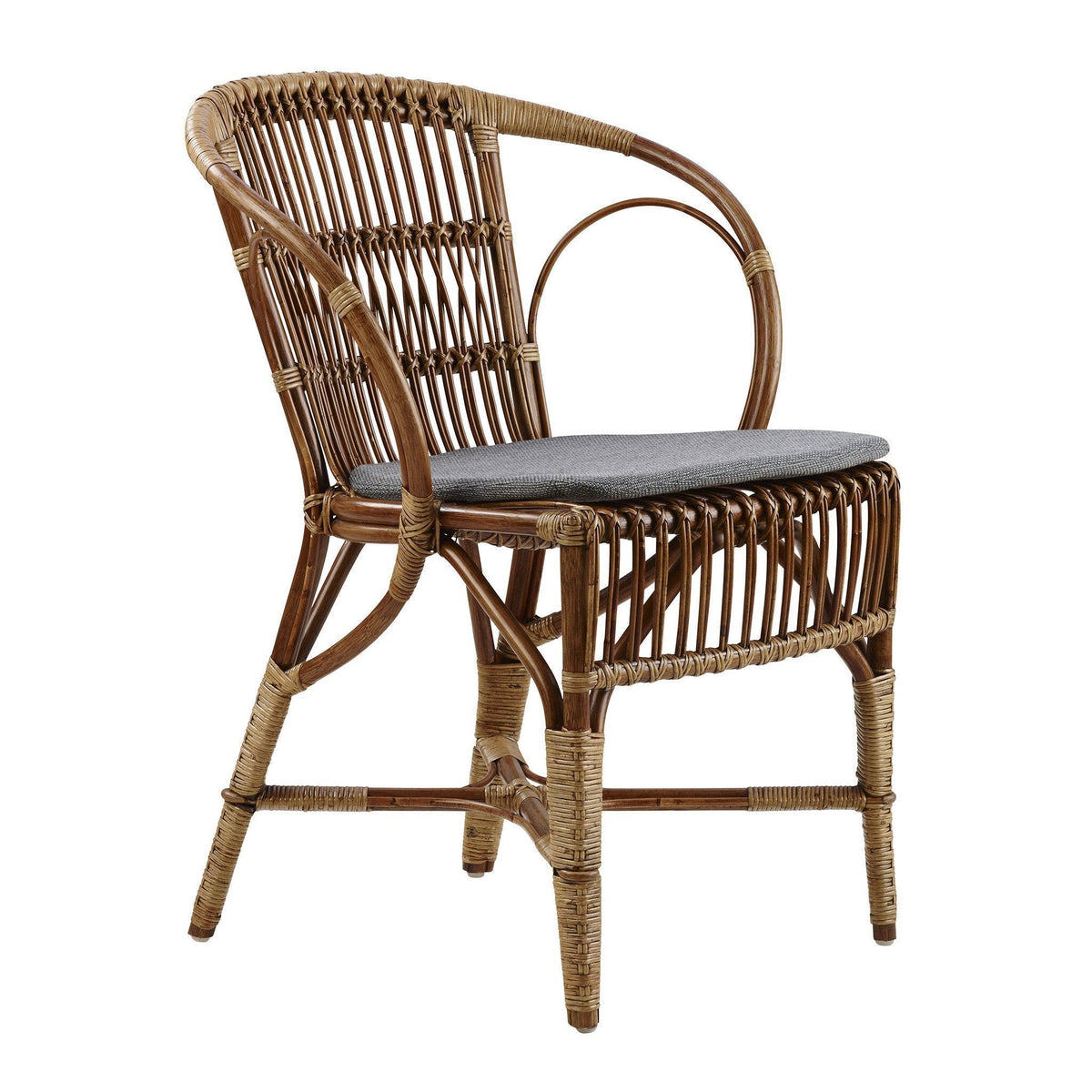 Stylish rattan chair in natural brown tones, featuring a sleek gray cushion and intricate woven patterns.
