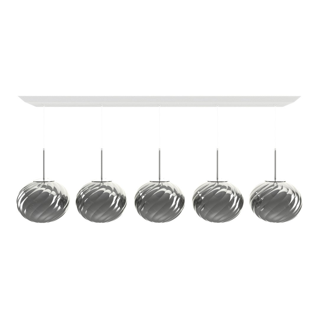 Shiny silver pendant lamps with a spiral pattern, hanging from a sleek white ceiling mount.