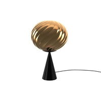 "Black base with a glossy, swirling golden orb lampshade, adding modern elegance to any decor."