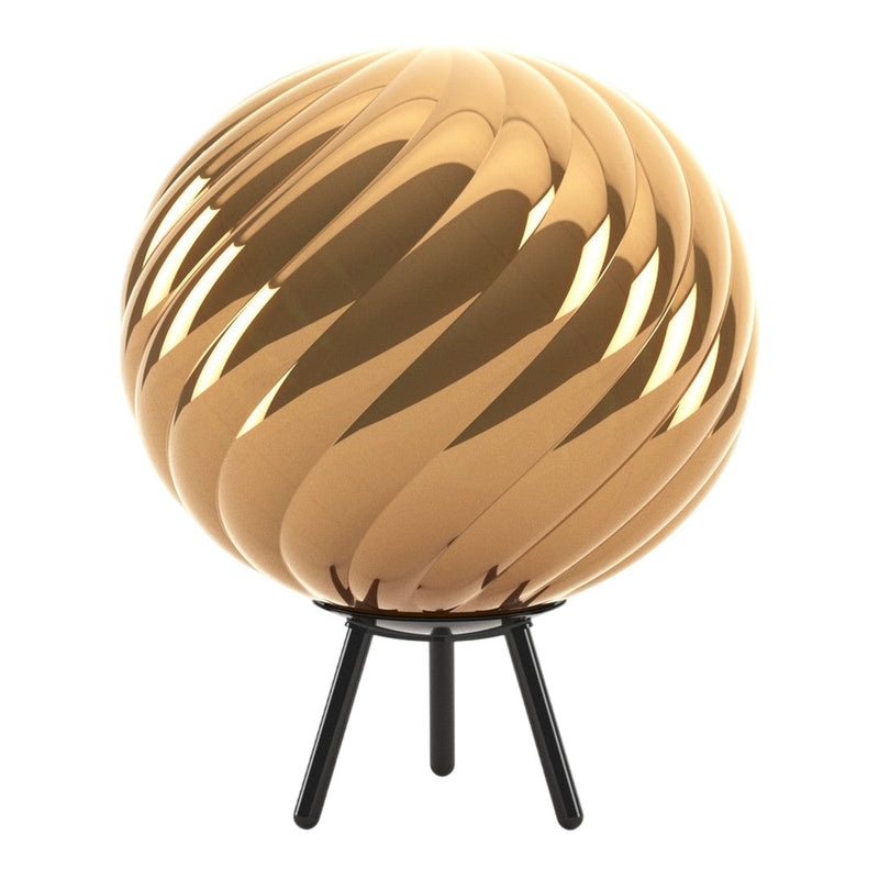Gold spiral decorative lamp on a black stand, featuring a glossy finish and a modern design. Perfect for stylish interiors.