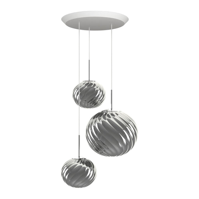 Three metallic pendant lights in silver finish, featuring elegant swirling patterns for a modern look.