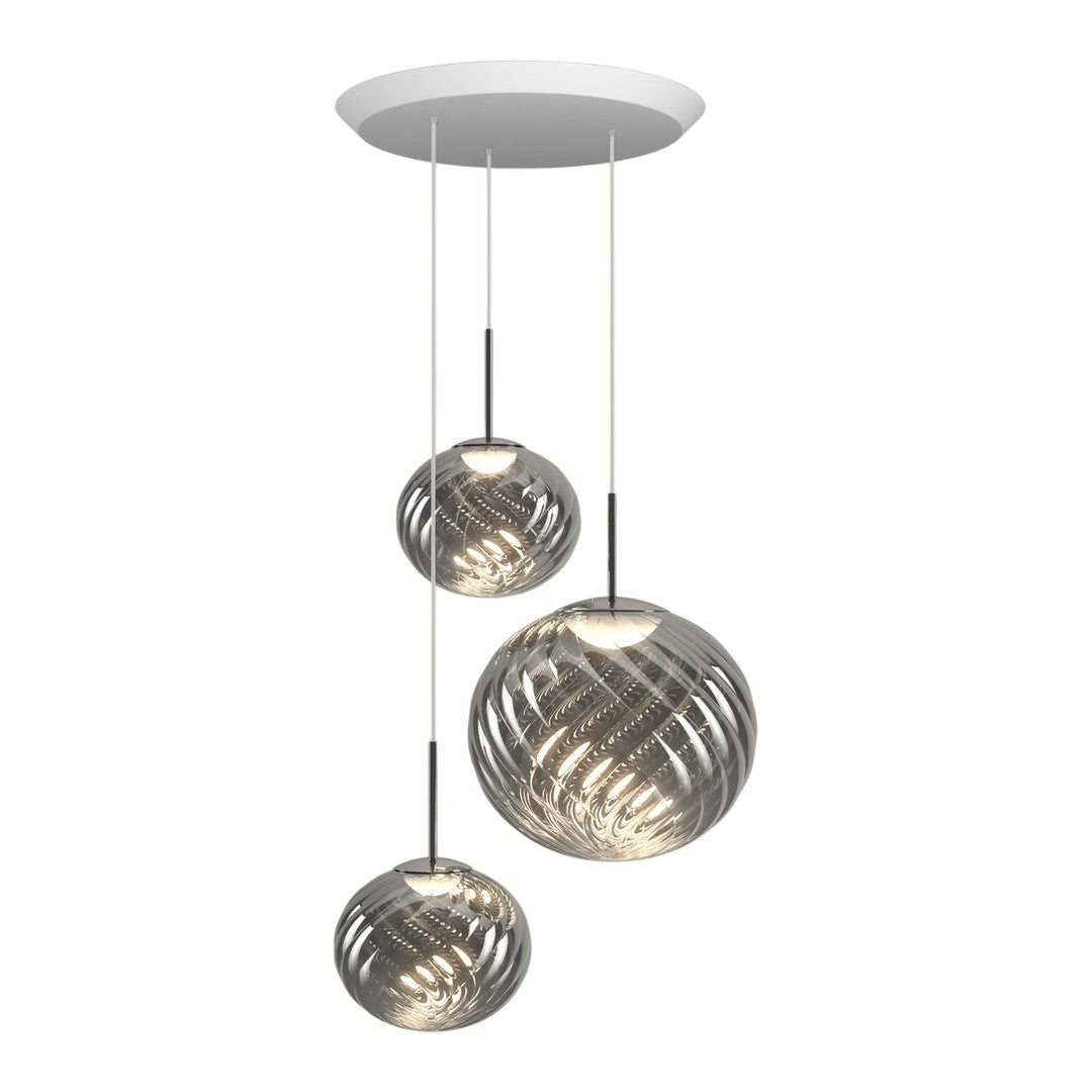 Three sleek, metallic pendant lights in silver tones with smooth swirling patterns. Modern ceiling fixture for elegant decor.