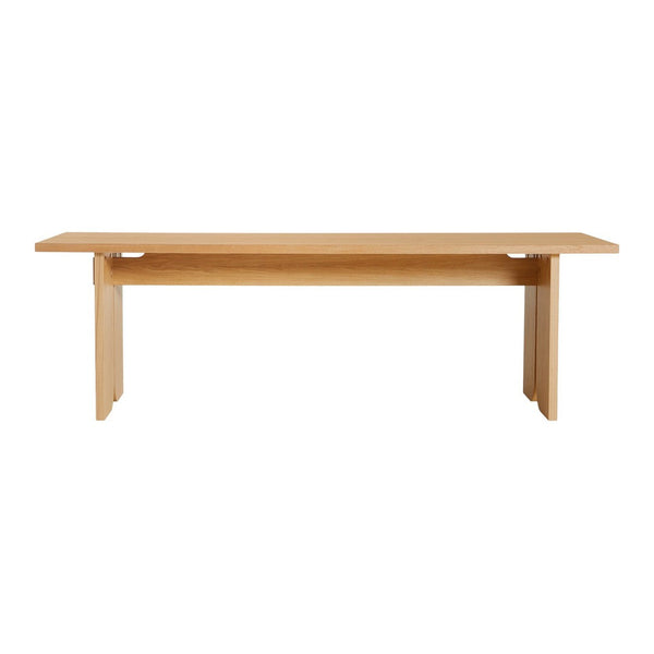 Light oak dining table with a smooth, natural wood finish and minimalist design, perfect for modern interiors.