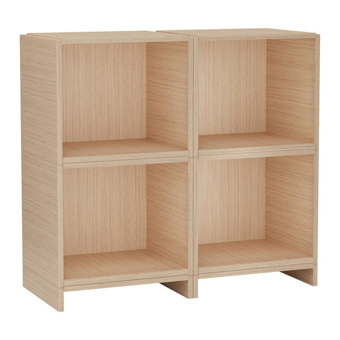 Light wood bookshelf with a natural grain pattern, featuring four open compartments in a minimalist design.