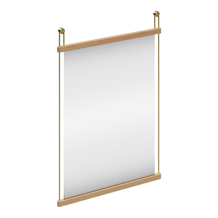Neutral-colored wall mirror with a simple, modern wooden frame and brass accents, perfect for any decor style.