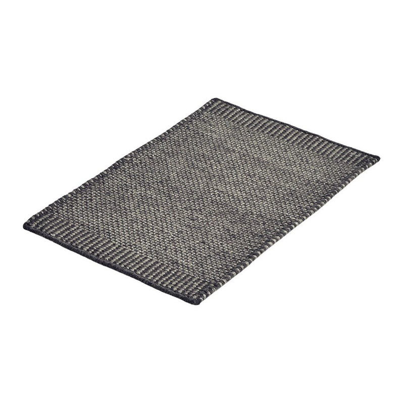 Gray and black woven rug with a textured pattern and contrasting border design. Ideal for modern decor.