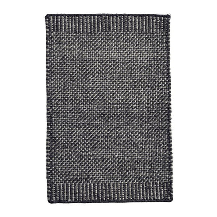 Gray woven rug with a textured pattern, featuring a dark border and a subtle light undertone. Ideal for modern decor.