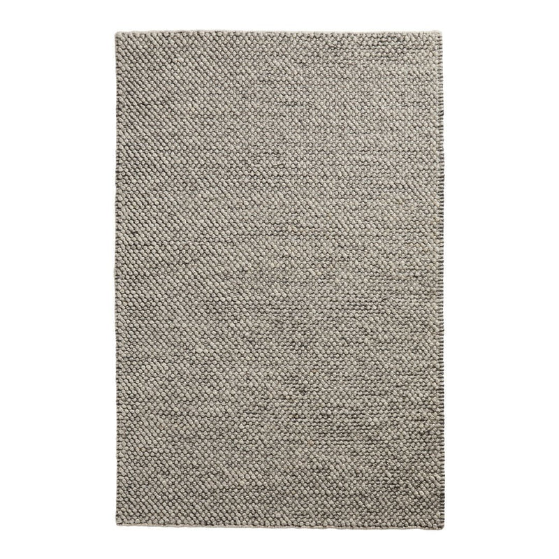 Textured gray and beige woven rug featuring a subtle herringbone pattern for a modern and cozy look.