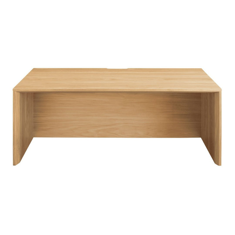 Light oak desk with a smooth finish and clean, minimalist design, featuring natural wood grain patterns.