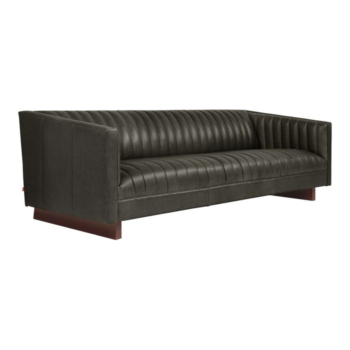 Dark green leather sofa with horizontal ribbed pattern and walnut base for modern elegance.