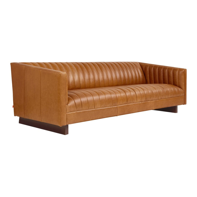 Tan leather sofa with vertical ribbed pattern and modern design, perfect for stylish living spaces.
