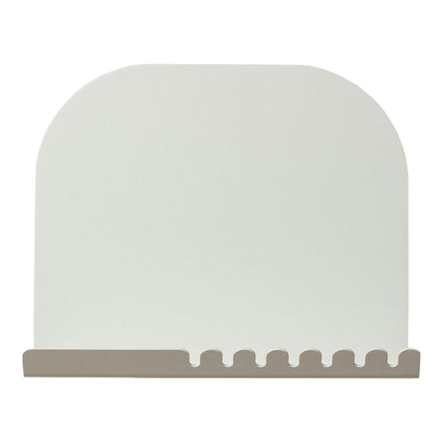 Minimalist white arch with a light brown base and cut-out pattern, perfect for modern decor.