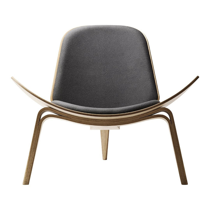 Modern chair featuring a sleek gray cushion and natural wood legs, showcasing a minimalist design.