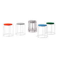 Colorful stools featuring red, blue, green, and gray seats with sleek wire frames, showcasing modern, minimalist design.