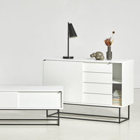 White modern furniture set with sleek black metal legs, featuring smooth surfaces and minimalist design.