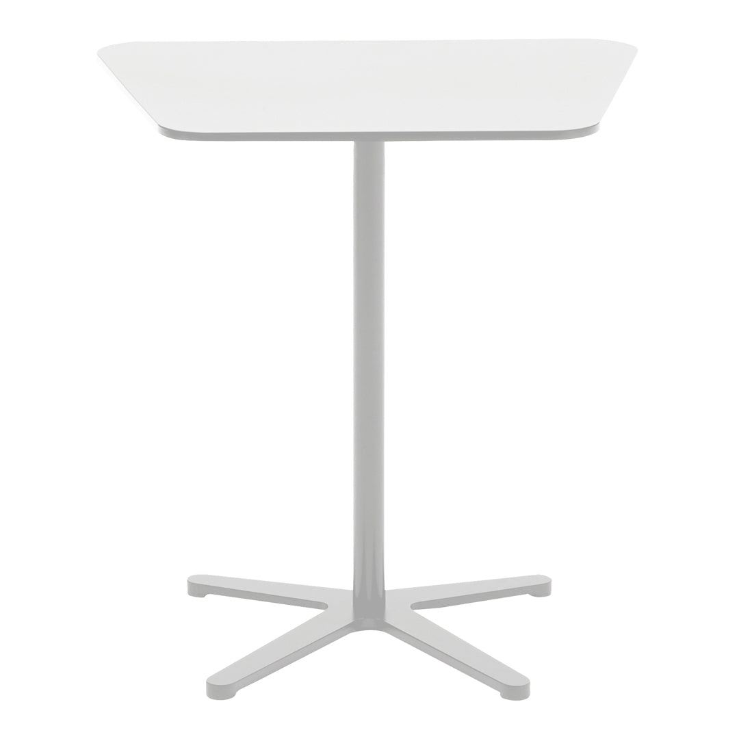 White dining table with a sleek, minimalist design and a light gray base, featuring smooth, clean lines.