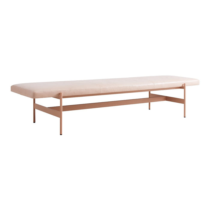 "Light pink upholstered bench with a simple wooden frame and clean lines, perfect for modern decor."