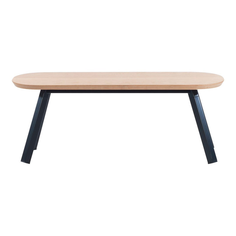 Light wood tabletop with a smooth finish, supported by sleek black metal legs. Modern and minimal design.