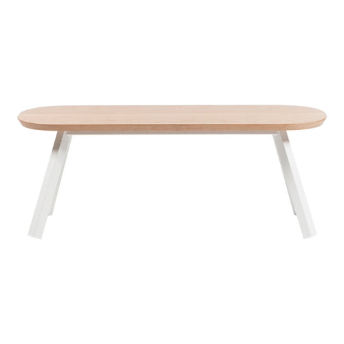 Light wood table with a natural finish and sleek white angular legs, perfect for modern decor.