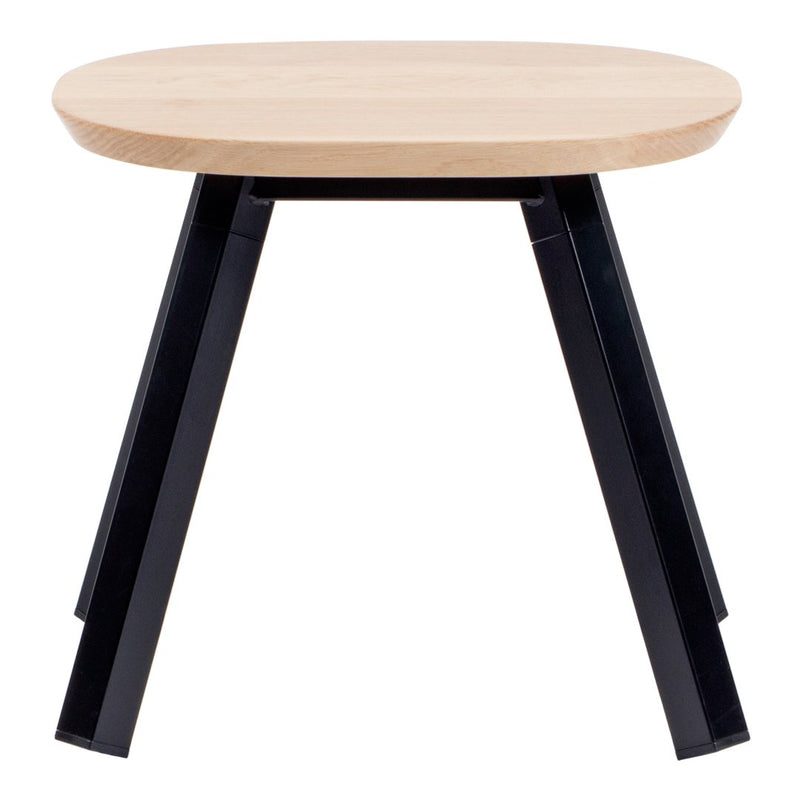 Light wood round top with sleek black legs, minimalistic design and natural finish for modern decor.