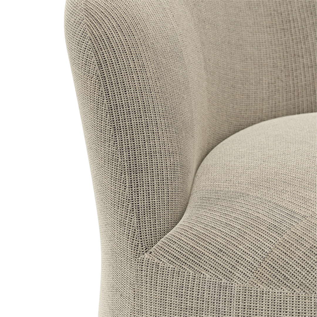 Textured beige upholstery featuring a subtle woven pattern for modern decor. Perfect for stylish interiors.