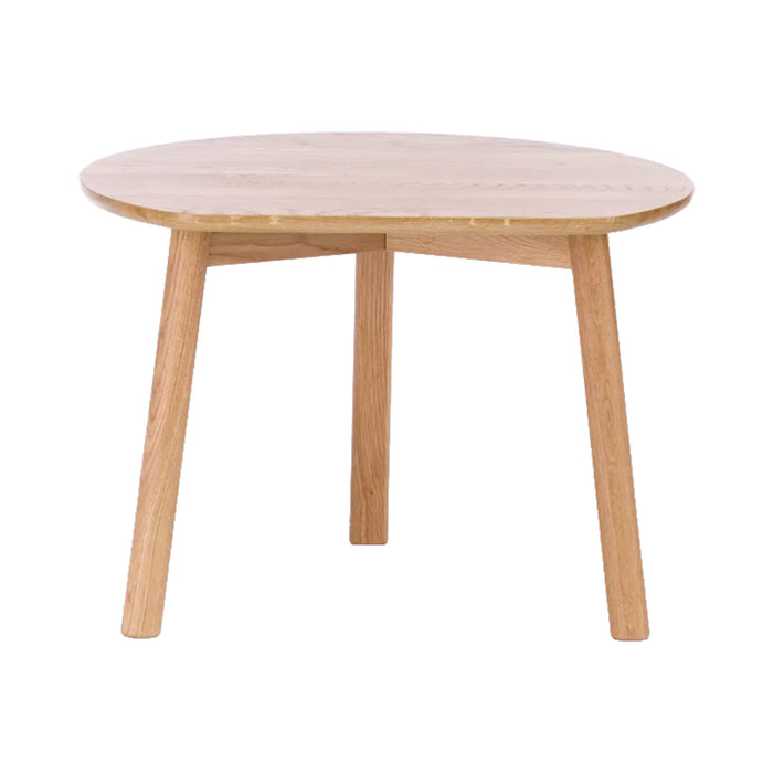Light oak round table with natural wood grain pattern and smooth finish, perfect for modern home decor.