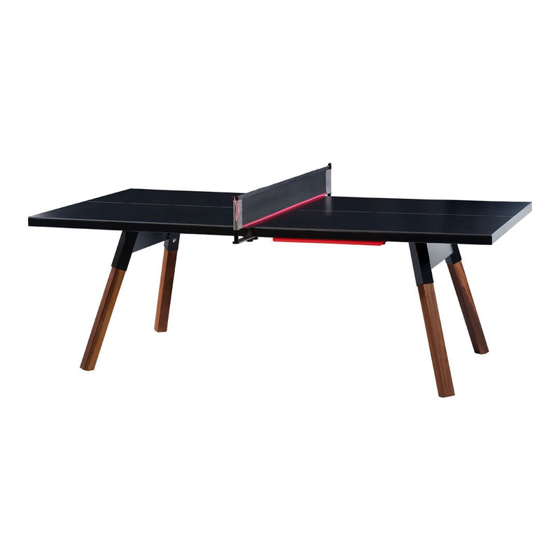 Sleek black ping pong table with walnut legs and a vibrant red net. Minimalist design, perfect for modern spaces.