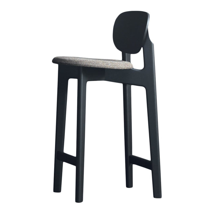Black wooden bar stool with a textured beige seat and smooth, minimalist design.