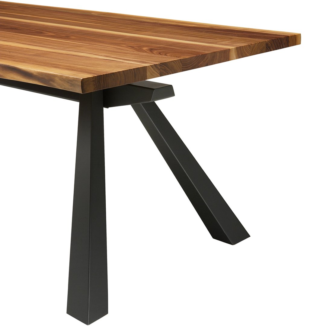 Wooden tabletop in rich brown tones with subtle grain; sleek black metal legs with a geometric design.