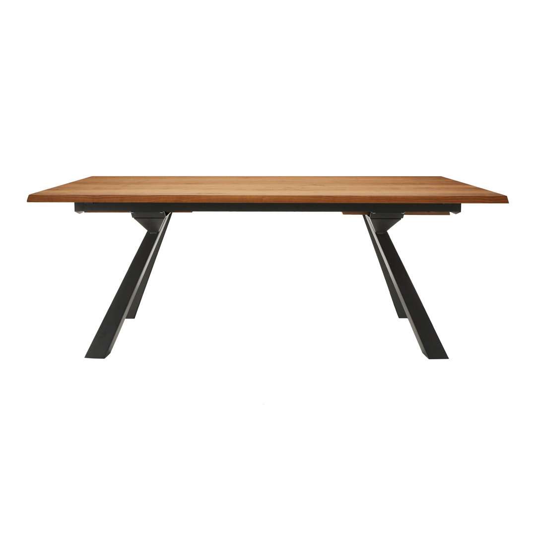Wooden table with a warm brown finish and sleek black metal legs. Simple, modern design with a minimalistic pattern.