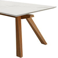 "White tabletop with subtle marbling and natural wood legs, showcasing a modern and sleek design."