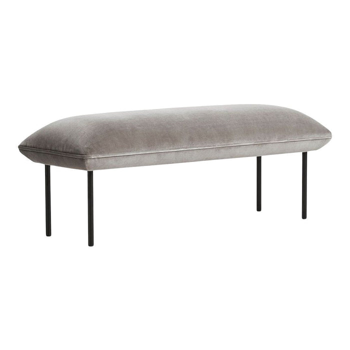 Gray velvet bench with smooth, subtle texture and sleek black metal legs, perfect for modern decor.