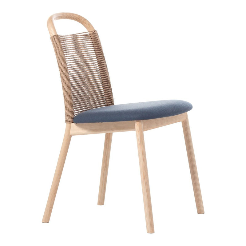 Light wood chair with a woven back and dark blue cushioned seat, featuring a modern and minimalistic design.