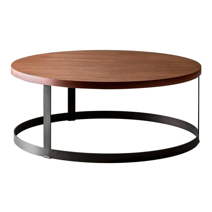 Round wooden coffee table with a rich brown finish and a sleek black metal base. Modern and minimalist design.