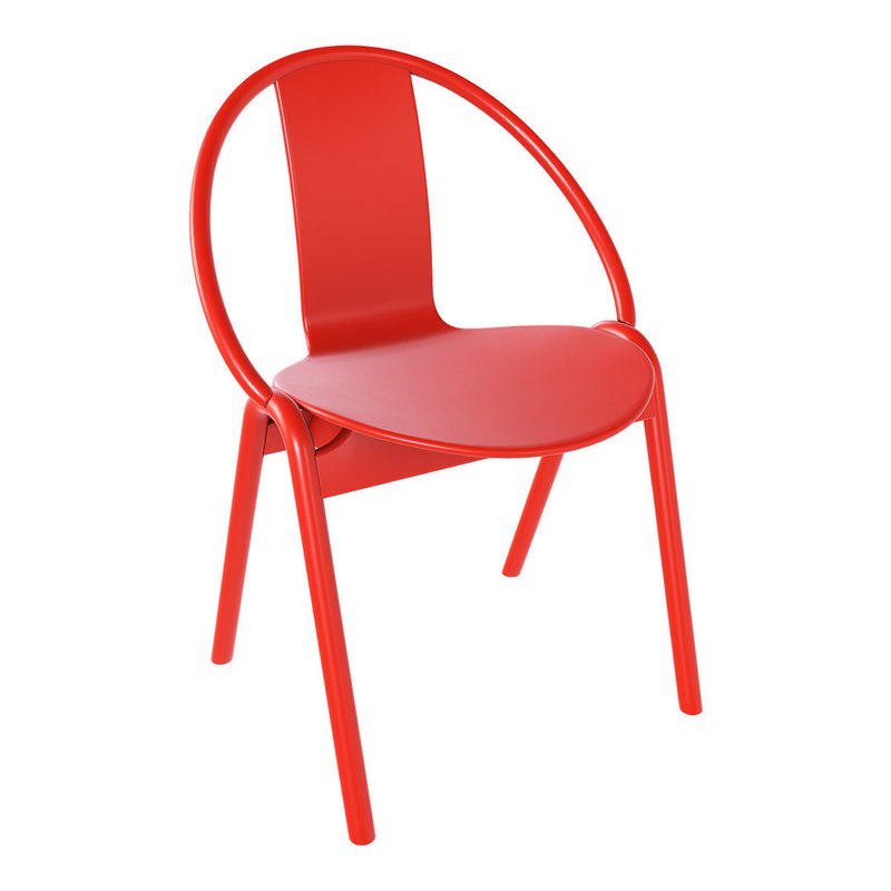 Bright red chair with a minimalist design and smooth, rounded edges, perfect for modern decor.