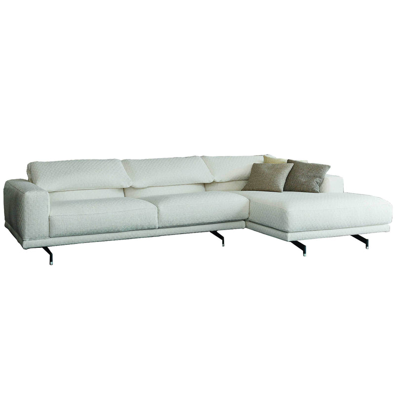 Luxury cream sectional sofa with sleek minimalist design and plush cushions. Perfect for modern living spaces.